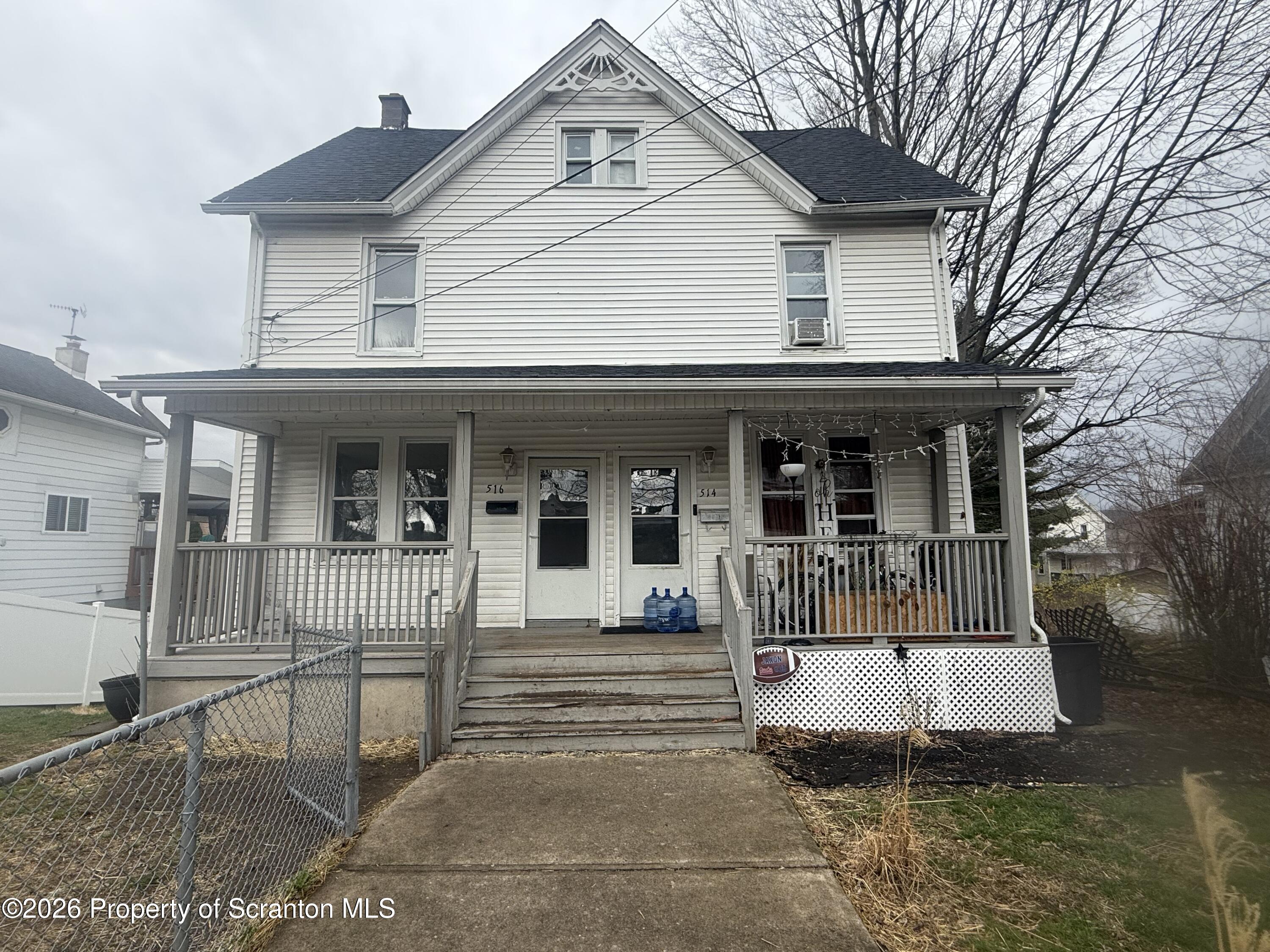 a front view of a house with a porch