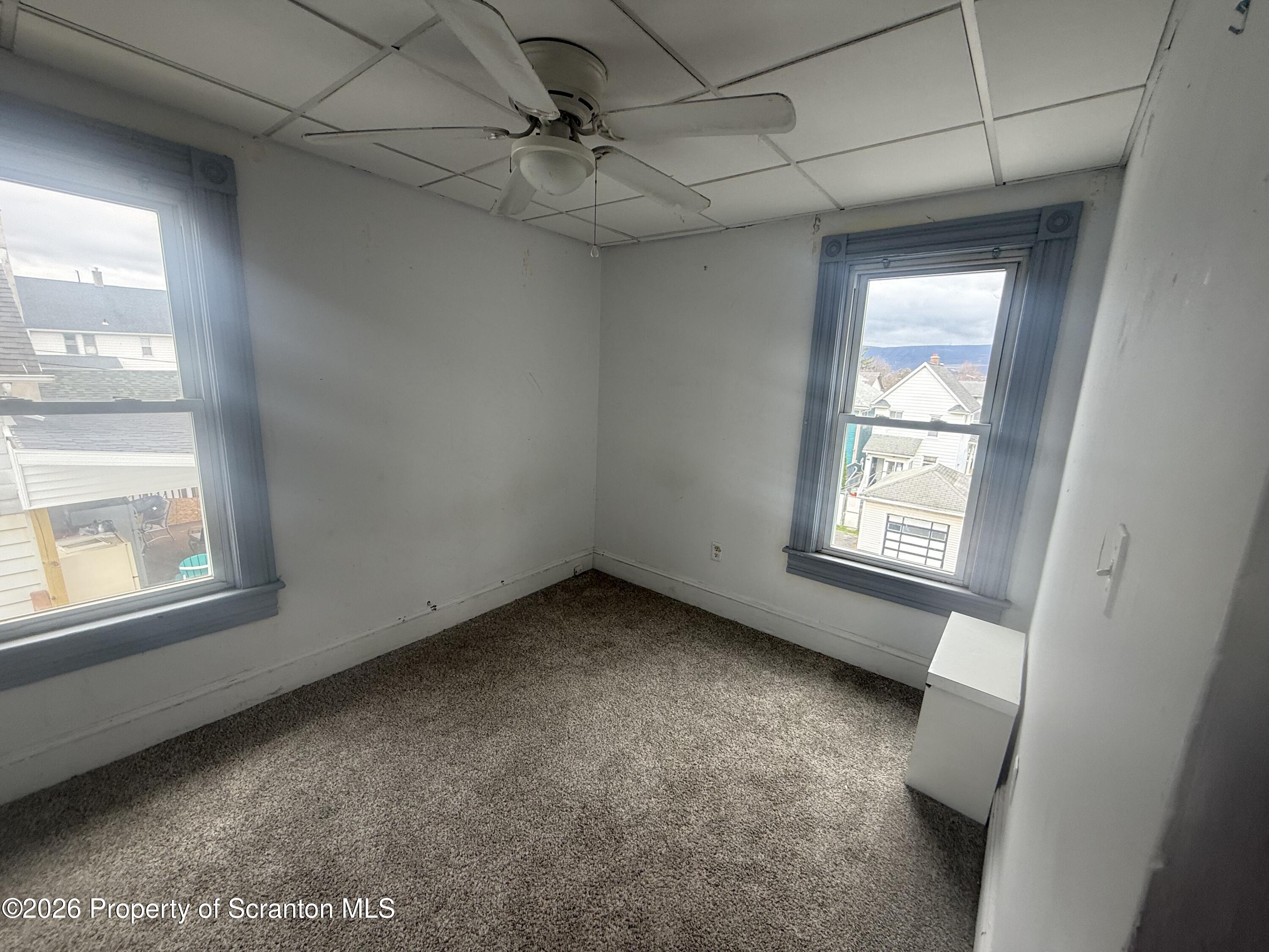516 4th Street Dunmore, PA 18512 - Photo 7 of 8 an empty room with a window