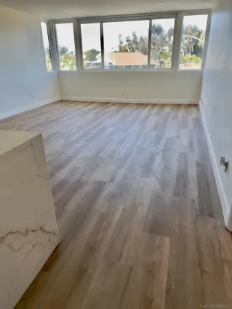 a view of an empty room and window