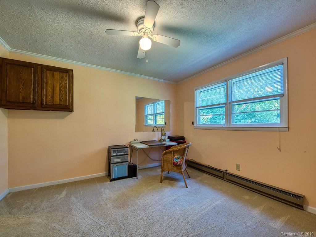 265 Shadow Ridge Sylva, NC 28779 - Photo 27 of 33 a view of a workspace with furniture and a window