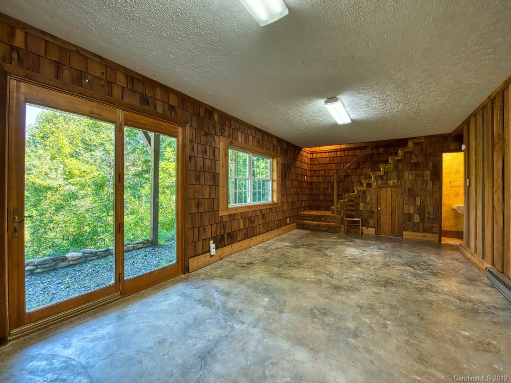 265 Shadow Ridge Sylva, NC 28779 - Photo 30 of 33 an empty room with furniture and windows