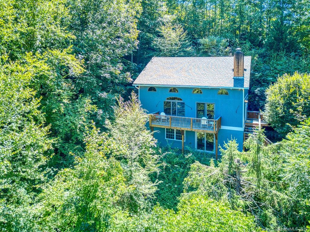 265 Shadow Ridge Sylva, NC 28779 - Photo 4 of 33 an aerial view of a house with swimming pool and garden