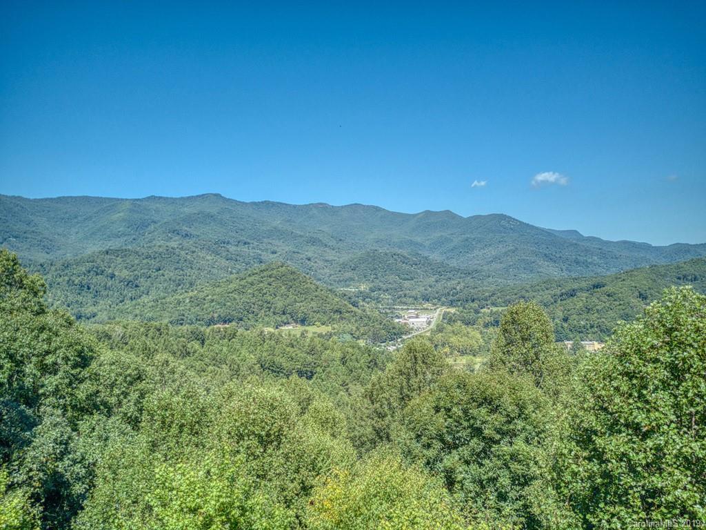 265 Shadow Ridge Sylva, NC 28779 - Photo 7 of 33 a view of a mountain range with lush green forest