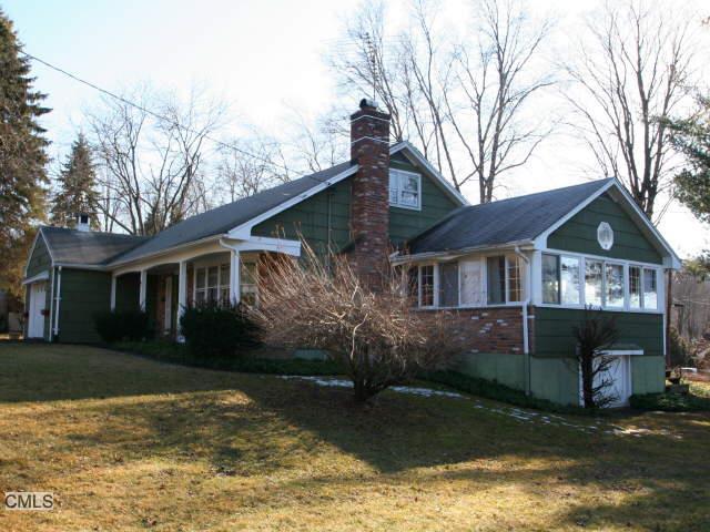 South Cove Road Brookfield, CT 06804 - Photo 1 of 1 a front view of a house with garden