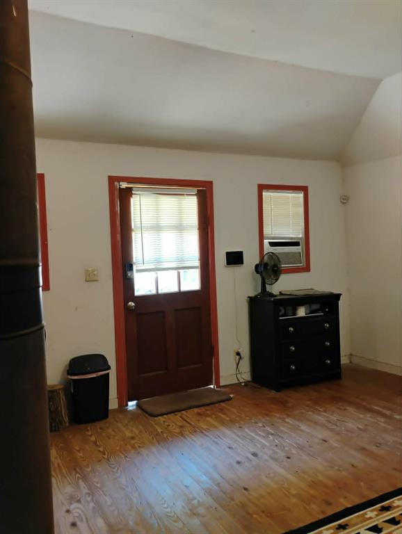 763 Frontier Street Bowie, TX 76230 - Photo 8 of 28 a bedroom with a bed and a dresser