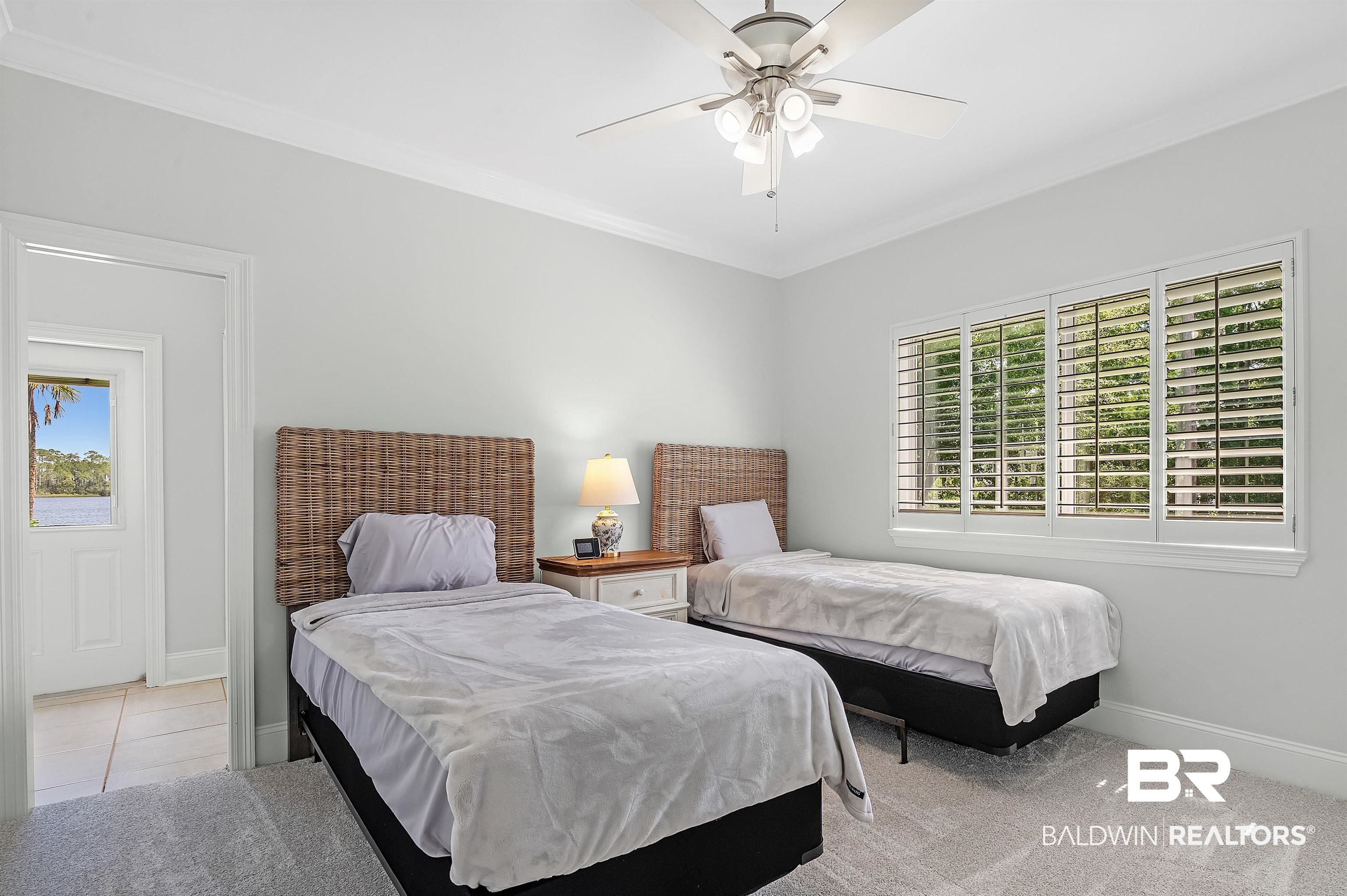 8160 Bay View Drive Foley, AL 36535 - Photo 26 of 43 Bedroom featuring baseboards and ceiling fan