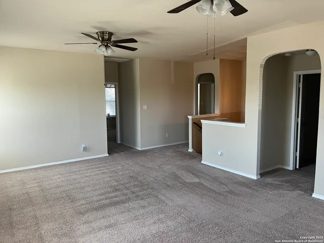 a view of a room with a chandelier