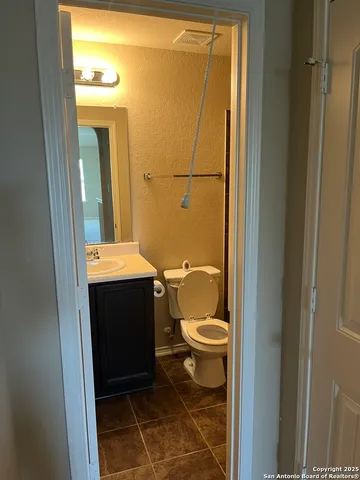 a bathroom with a sink and a toilet