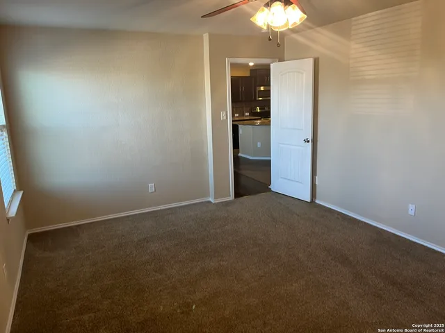 an empty room with a bathroom