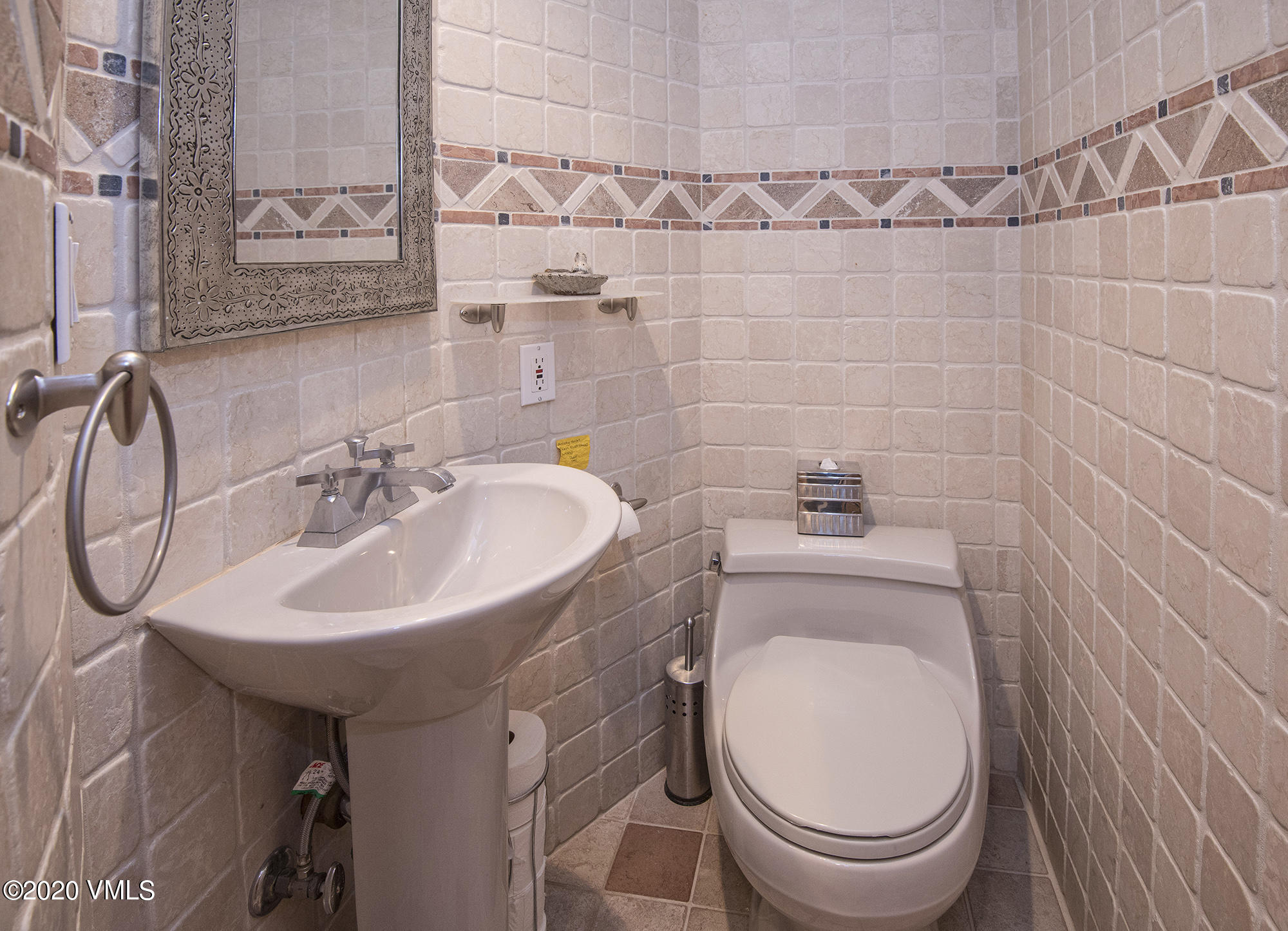 225 Wall Street, Unit 307 Vail, CO 81657 - Photo 13 of 31 a bathroom with a sink a toilet and shower