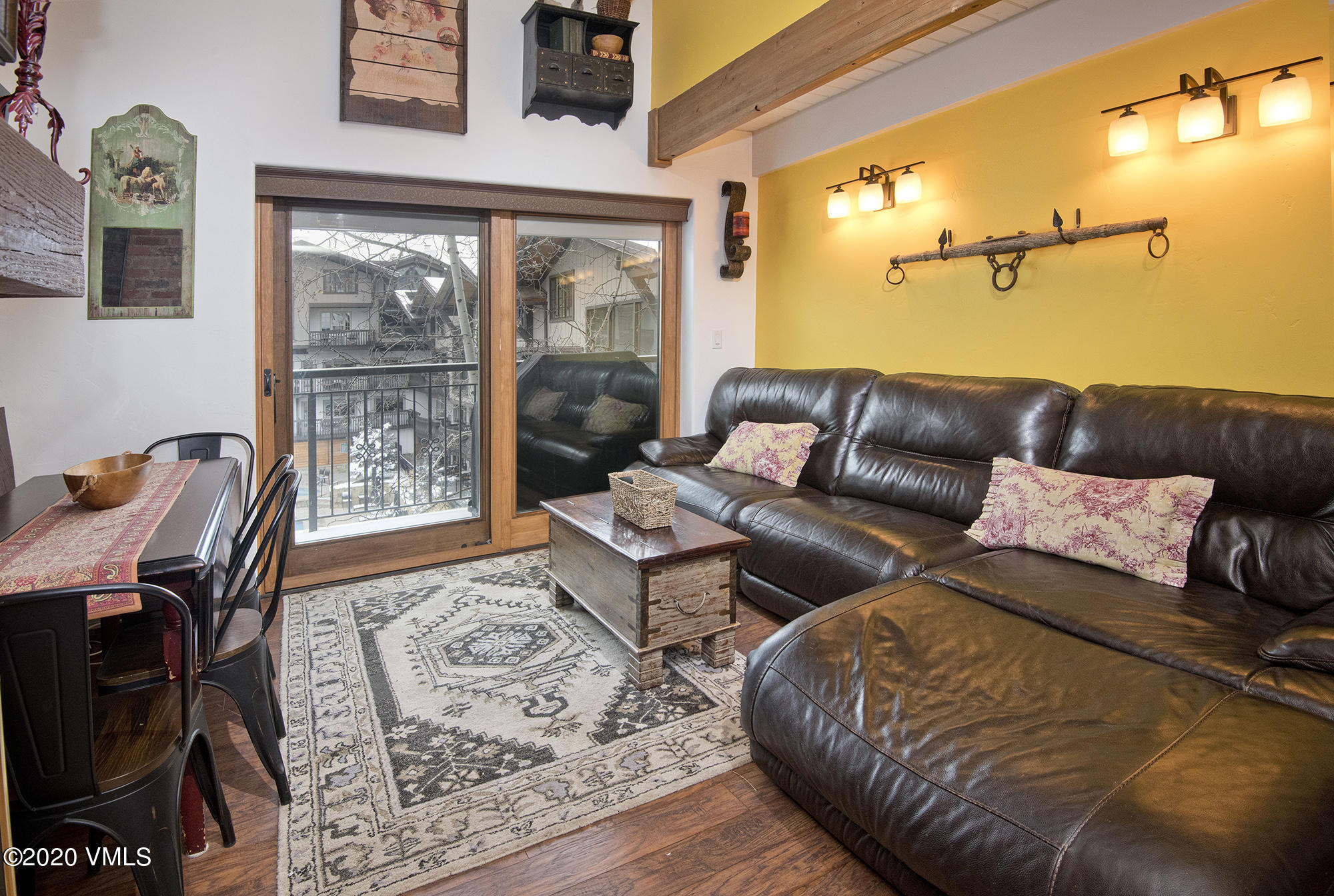 225 Wall Street, Unit 307 Vail, CO 81657 - Photo 3 of 31 a living room with furniture and a window