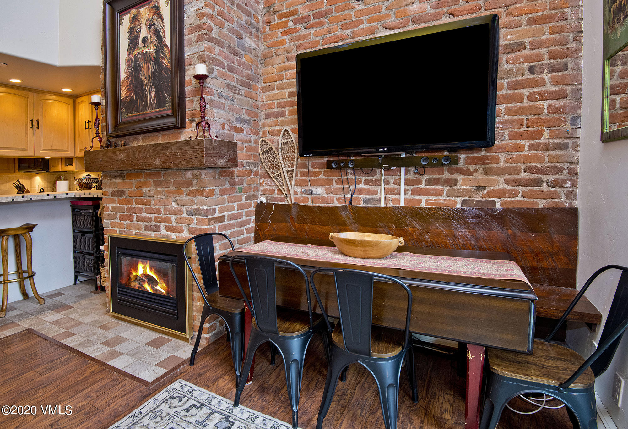 225 Wall Street, Unit 307 Vail, CO 81657 - Photo 5 of 31 a outdoor dining space with furniture and flat screen tv