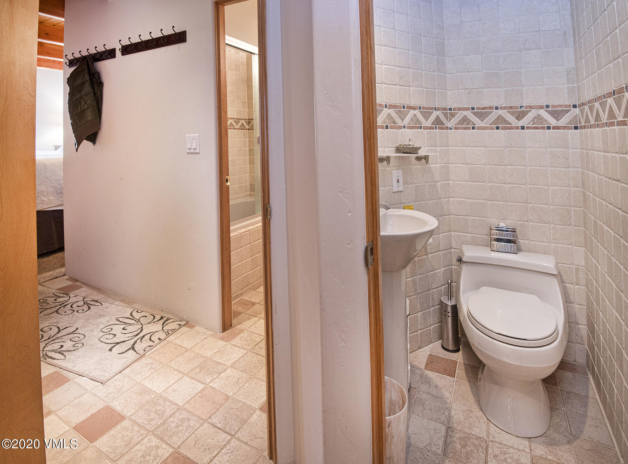 225 Wall Street, Unit 307 Vail, CO 81657 - Photo 10 of 31 a bathroom with a toilet and a shower