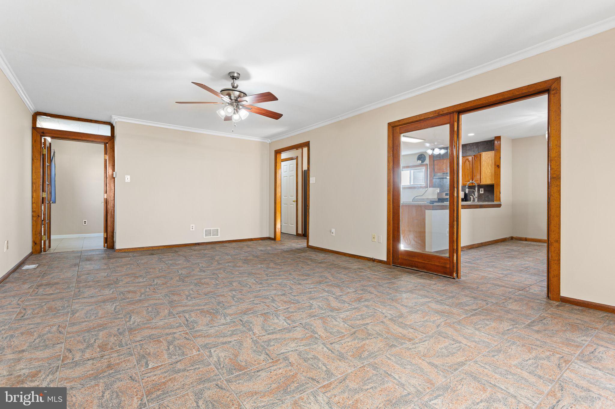 2623 Knights Road Bensalem, PA 19020 - Photo 9 of 50 an empty room with closet and a ceiling fan