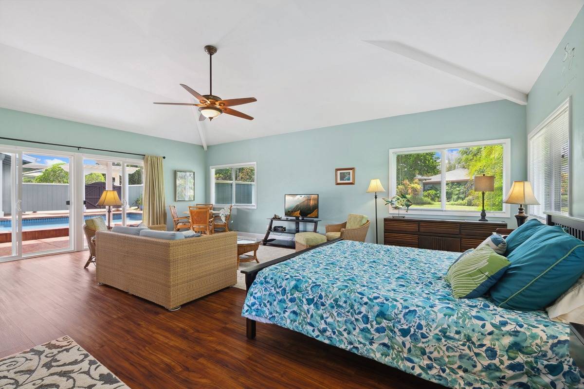 1661 Huli Road Kilauea, HI 96754 - Photo 21 of 28 a living room with furniture ceiling fan and a window