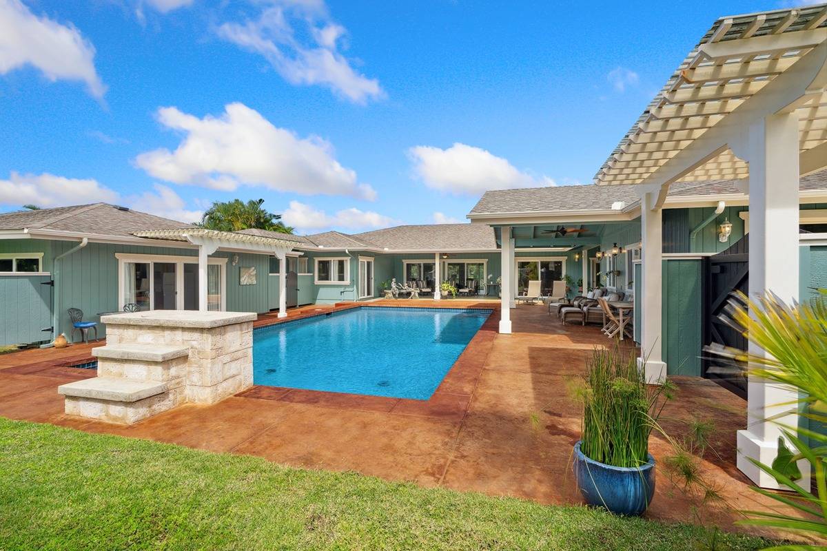 1661 Huli Road Kilauea, HI 96754 - Photo 6 of 28 a front view of a house with garden