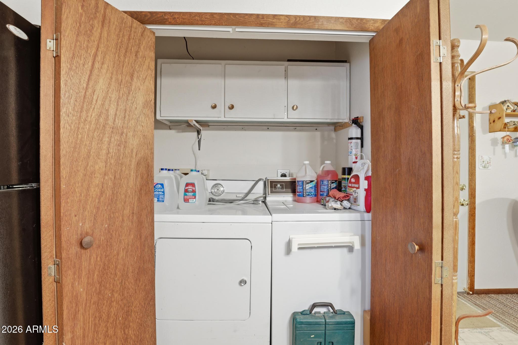 223 Thompson Road Payson, AZ 85541 - Photo 13 of 22 a utility room with dryer and washer