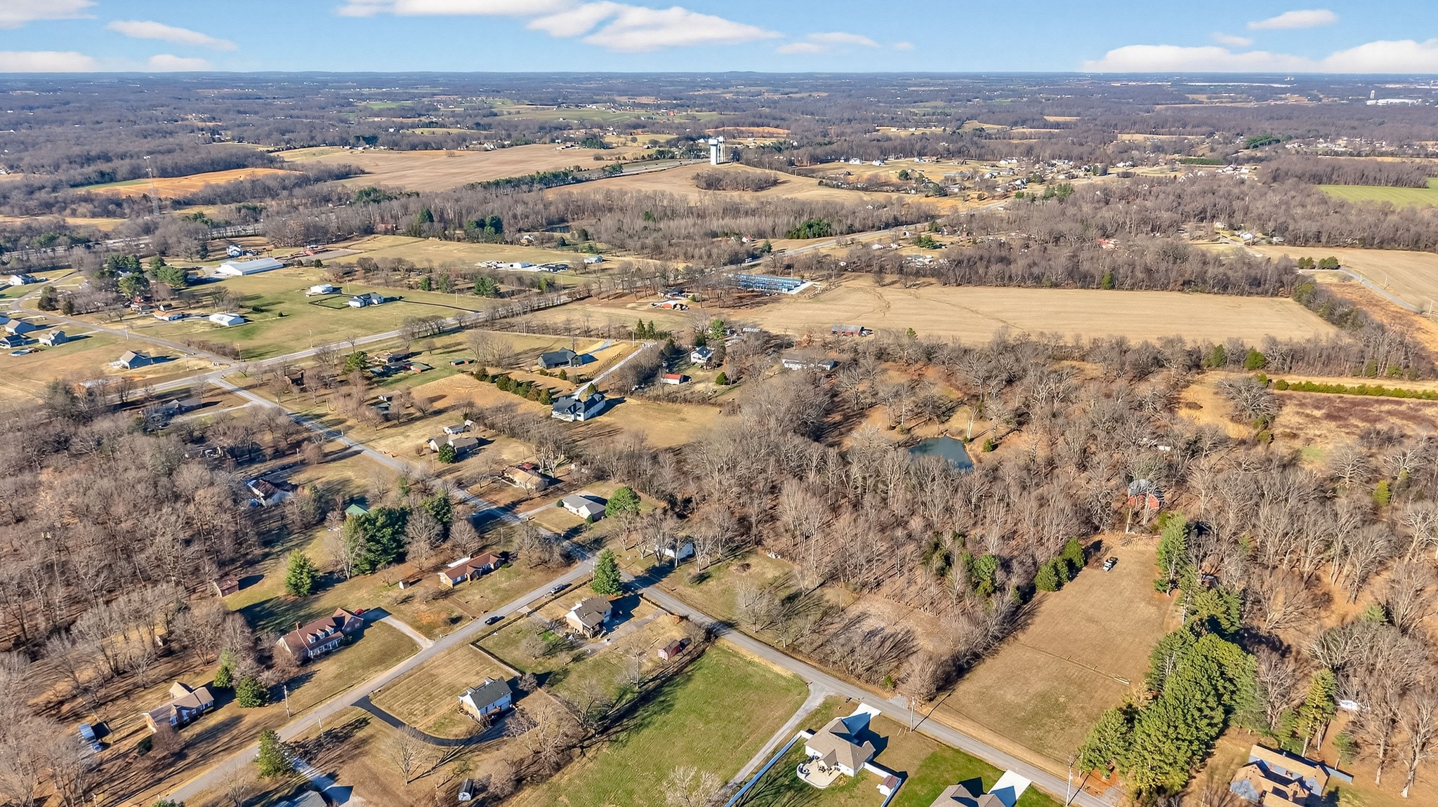 1991 Raymond Hodges Road Cottontown, TN 37048 - Photo 13 of 18 an aerial view of residential houses with outdoor space