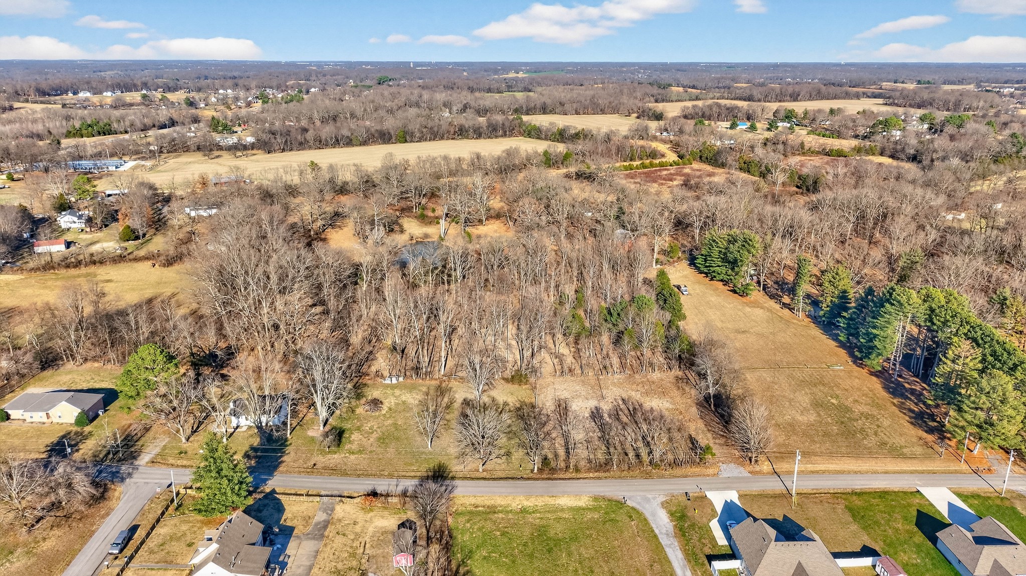 1991 Raymond Hodges Road Cottontown, TN 37048 - Photo 7 of 18 an aerial view of residential houses with outdoor space