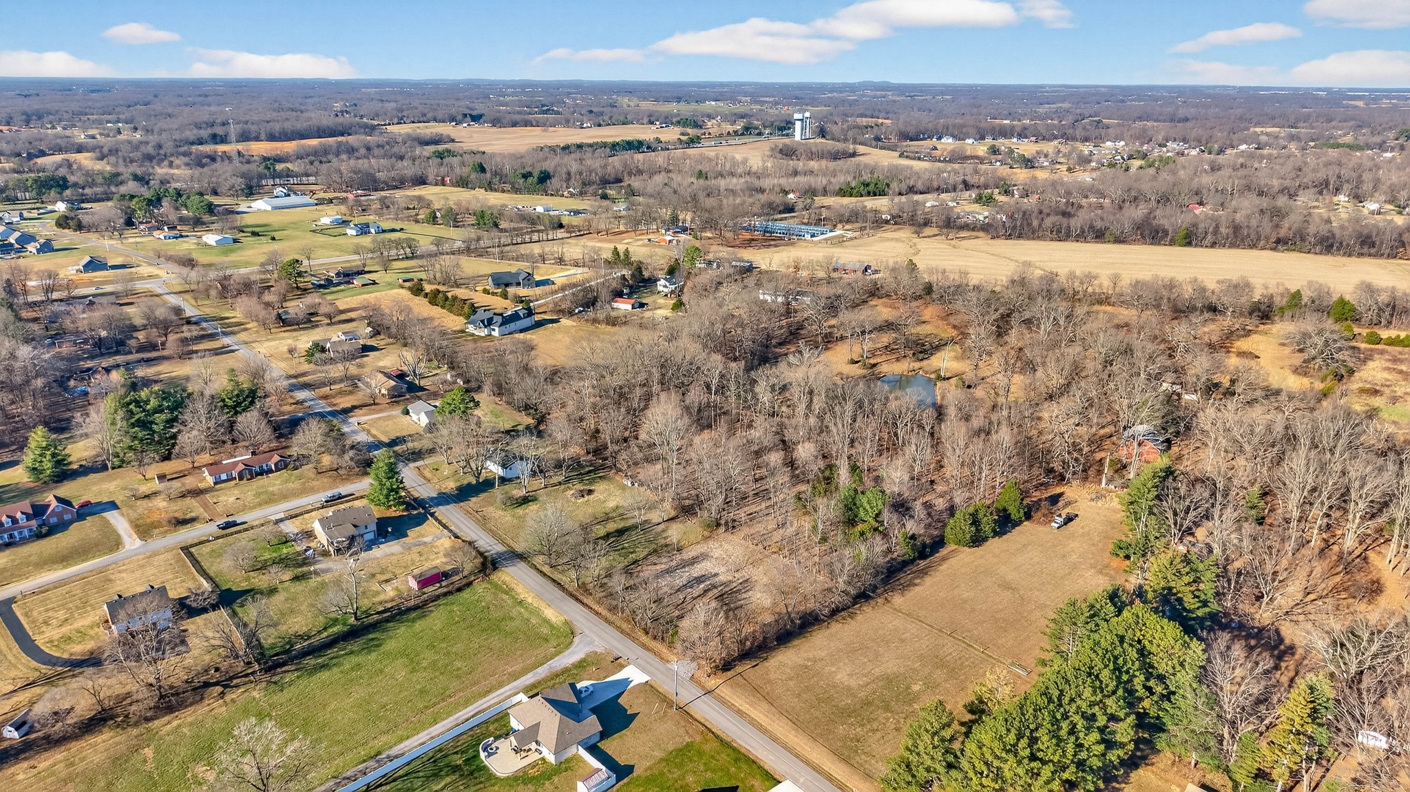 1991 Raymond Hodges Road Cottontown, TN 37048 - Photo 8 of 18 an aerial view of residential houses with outdoor space
