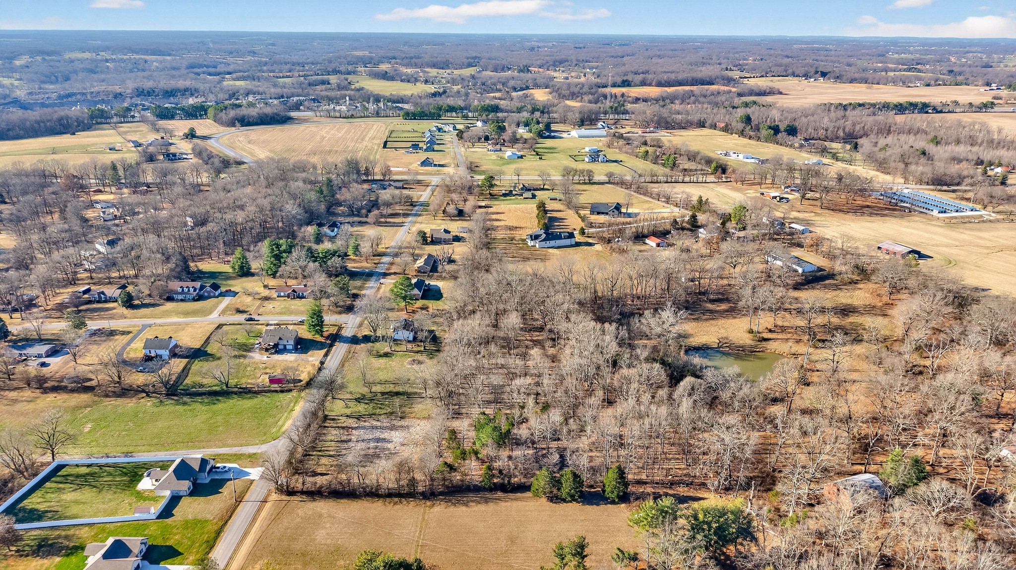 1991 Raymond Hodges Road Cottontown, TN 37048 - Photo 9 of 18 an aerial view of residential houses with outdoor space