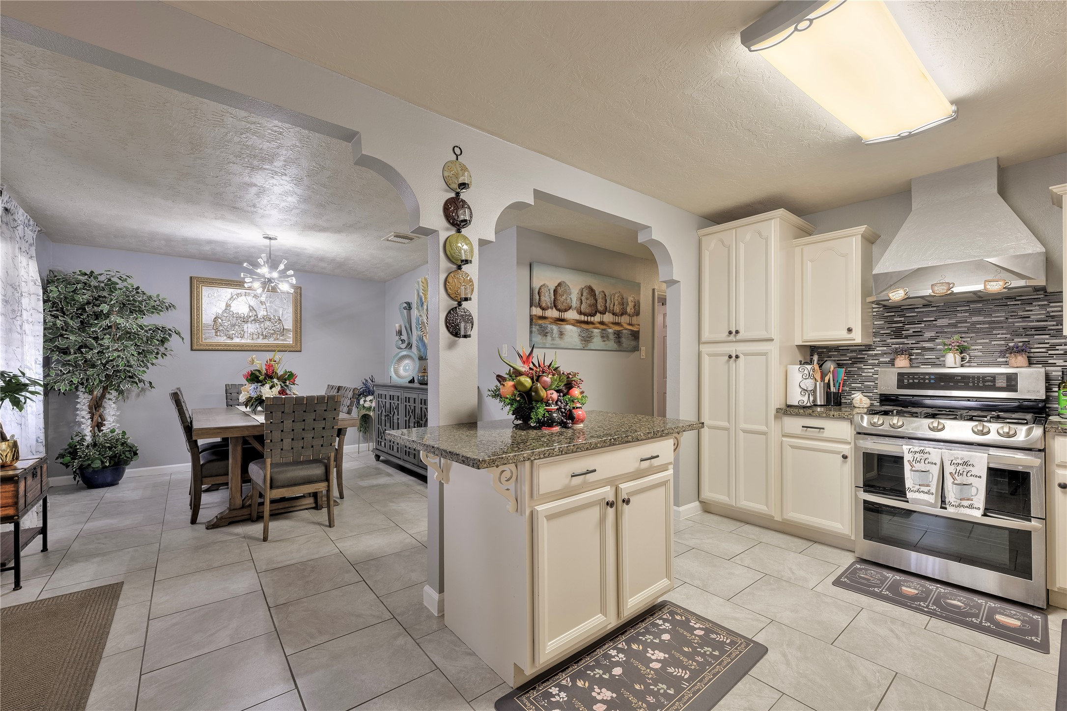 4110 Anice Street Houston, TX 77039 - Photo 12 of 29 a kitchen with a cabinets and chairs