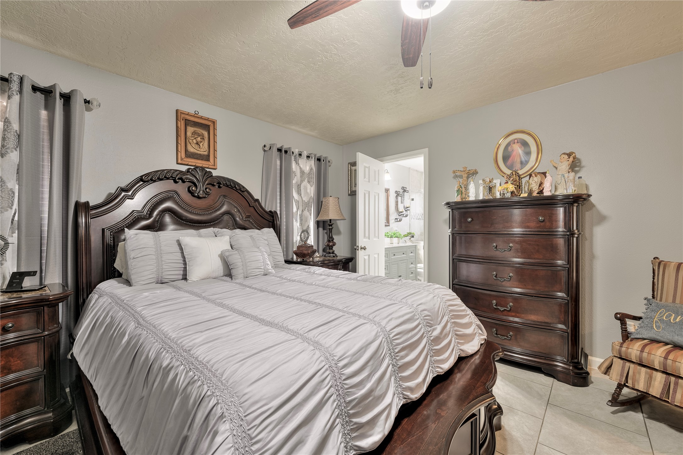 4110 Anice Street Houston, TX 77039 - Photo 16 of 29 a bedroom with a bed and a dresser