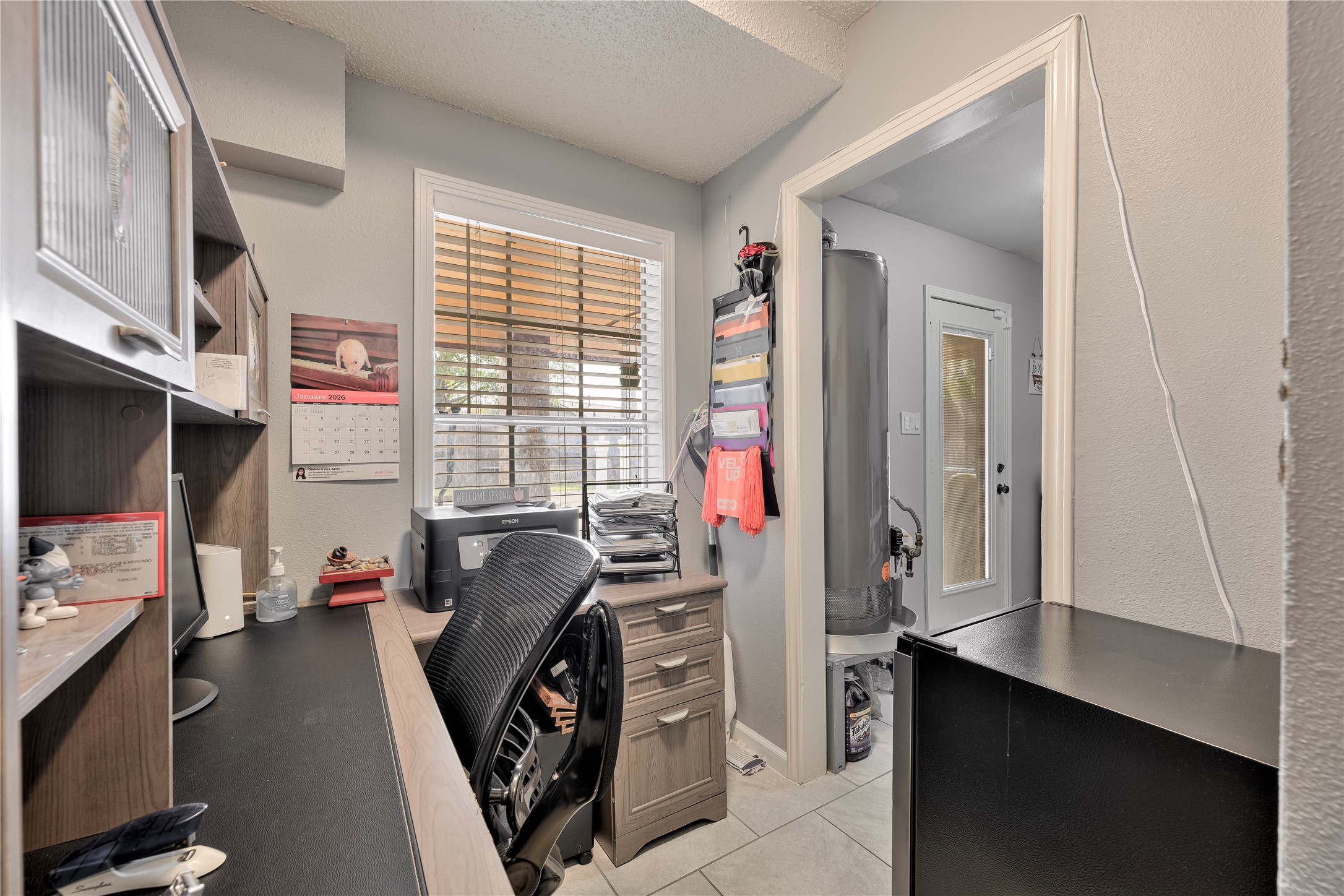 4110 Anice Street Houston, TX 77039 - Photo 22 of 29 a view of a livingroom with workspace and a window
