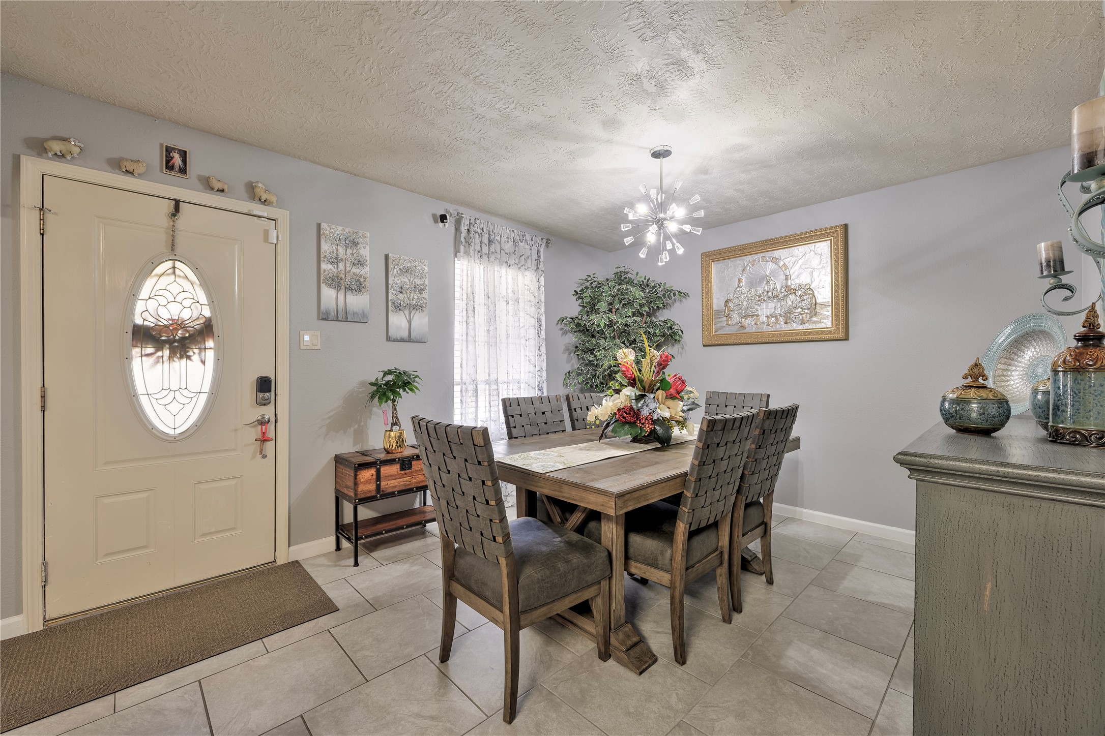 4110 Anice Street Houston, TX 77039 - Photo 6 of 29 a view of a dining room with furniture and chandelier