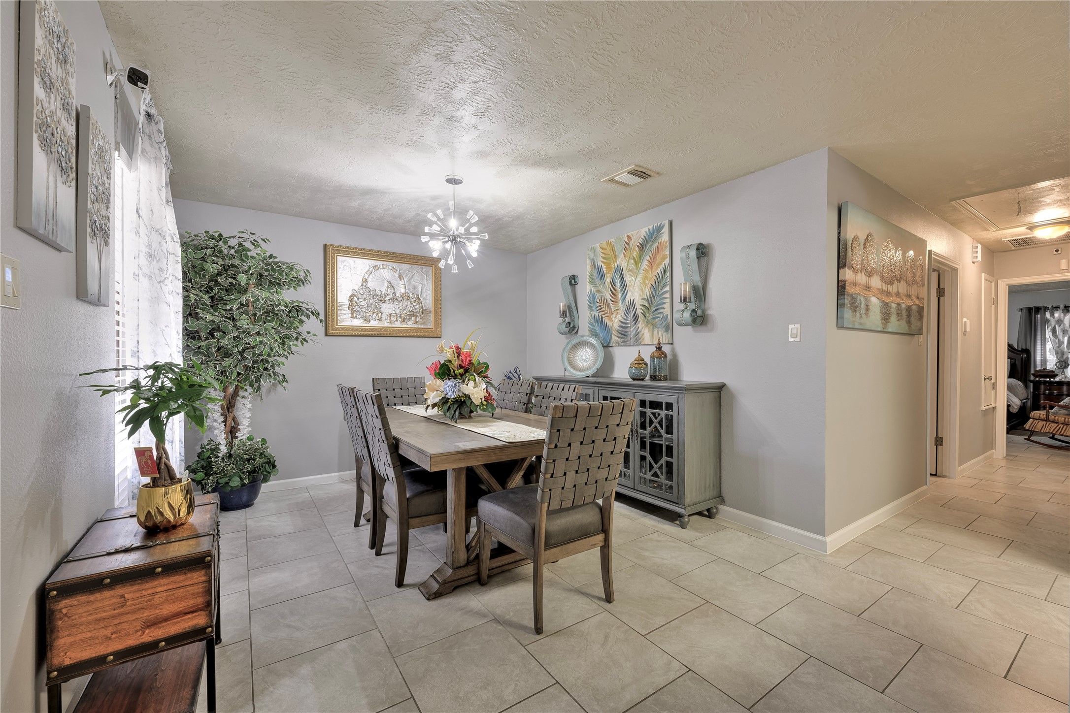 4110 Anice Street Houston, TX 77039 - Photo 7 of 29 a view of a dining room with furniture and chandelier
