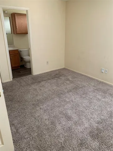 a bathroom with a glass door