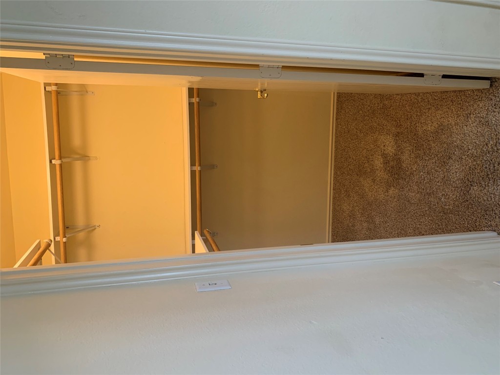 11904 Lima Drive Manor, TX 78653 - Photo 9 of 10 a bathroom with a glass door