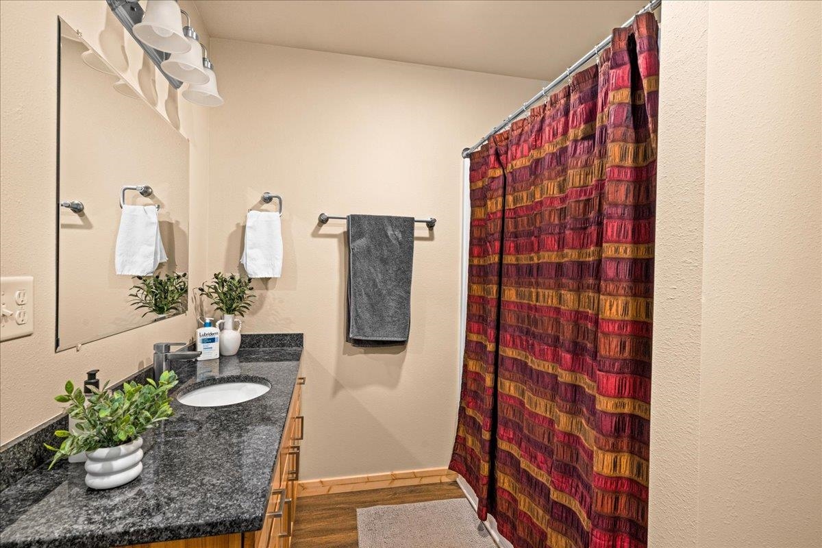 11411 West 3rd Street Solon Springs, WI 54873 - Photo 16 of 33 features Hickory Cabinetry, Granite Counters, and combo Tub/Shower