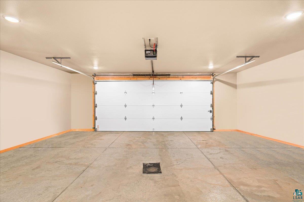 11411 South 3rd Street East Solon Springs, WI 54873 - Photo 25 of 40 is insulated, heated, includes a door to side of home, and the Utility Room is also located within the Garage.