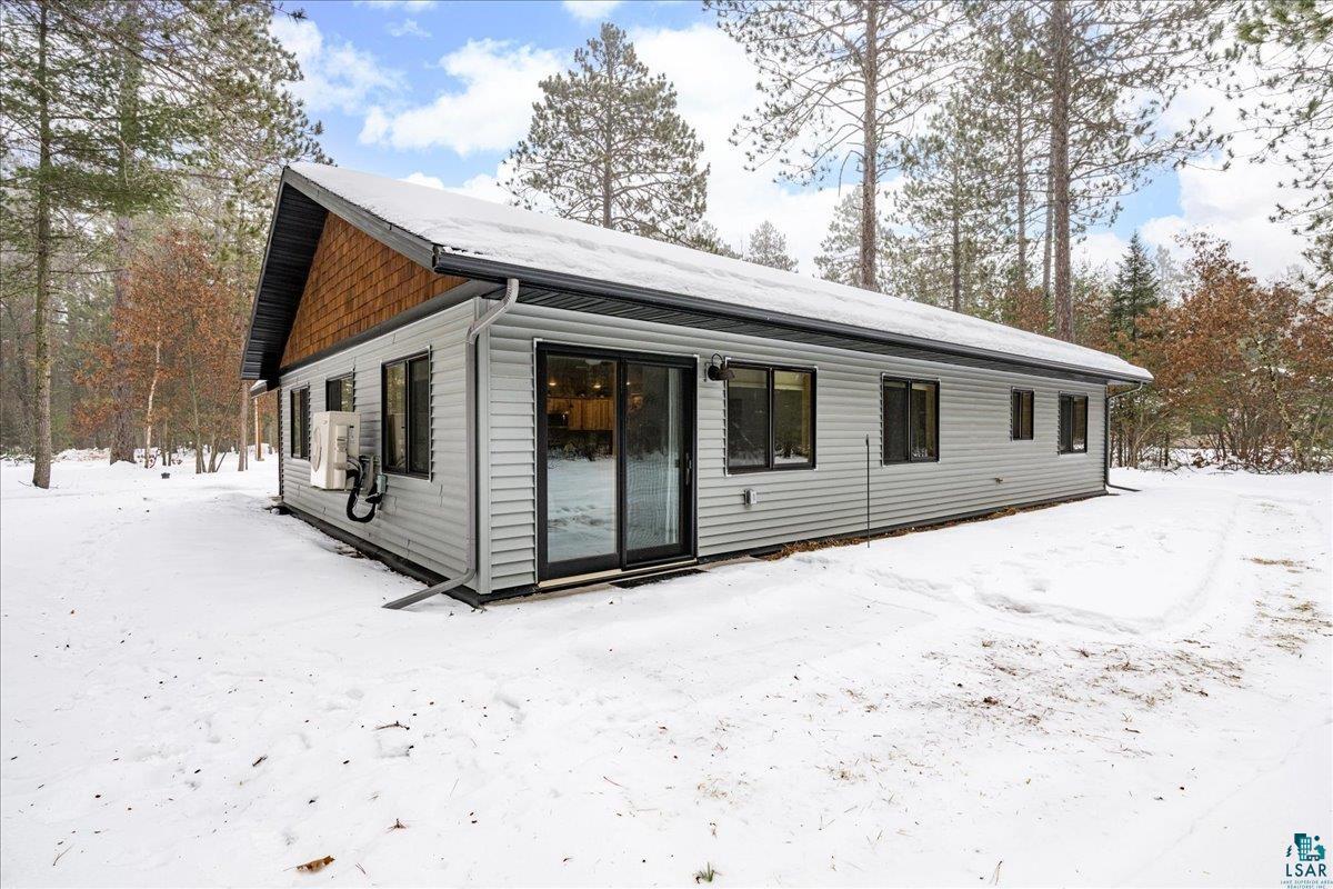 11411 South 3rd Street East Solon Springs, WI 54873 - Photo 28 of 40 Just located outside of sliders is a concrete Patio.