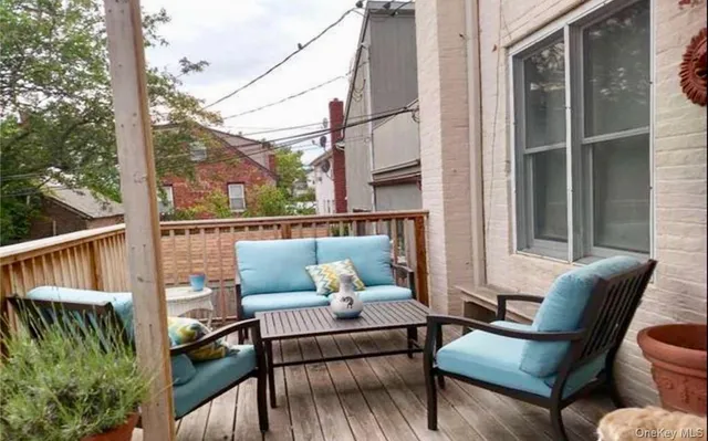 a view of a chairs in the balcony