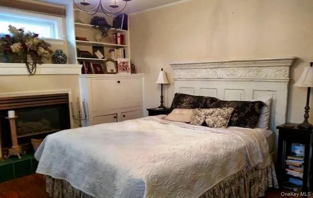 a bedroom with a bed and cabinets