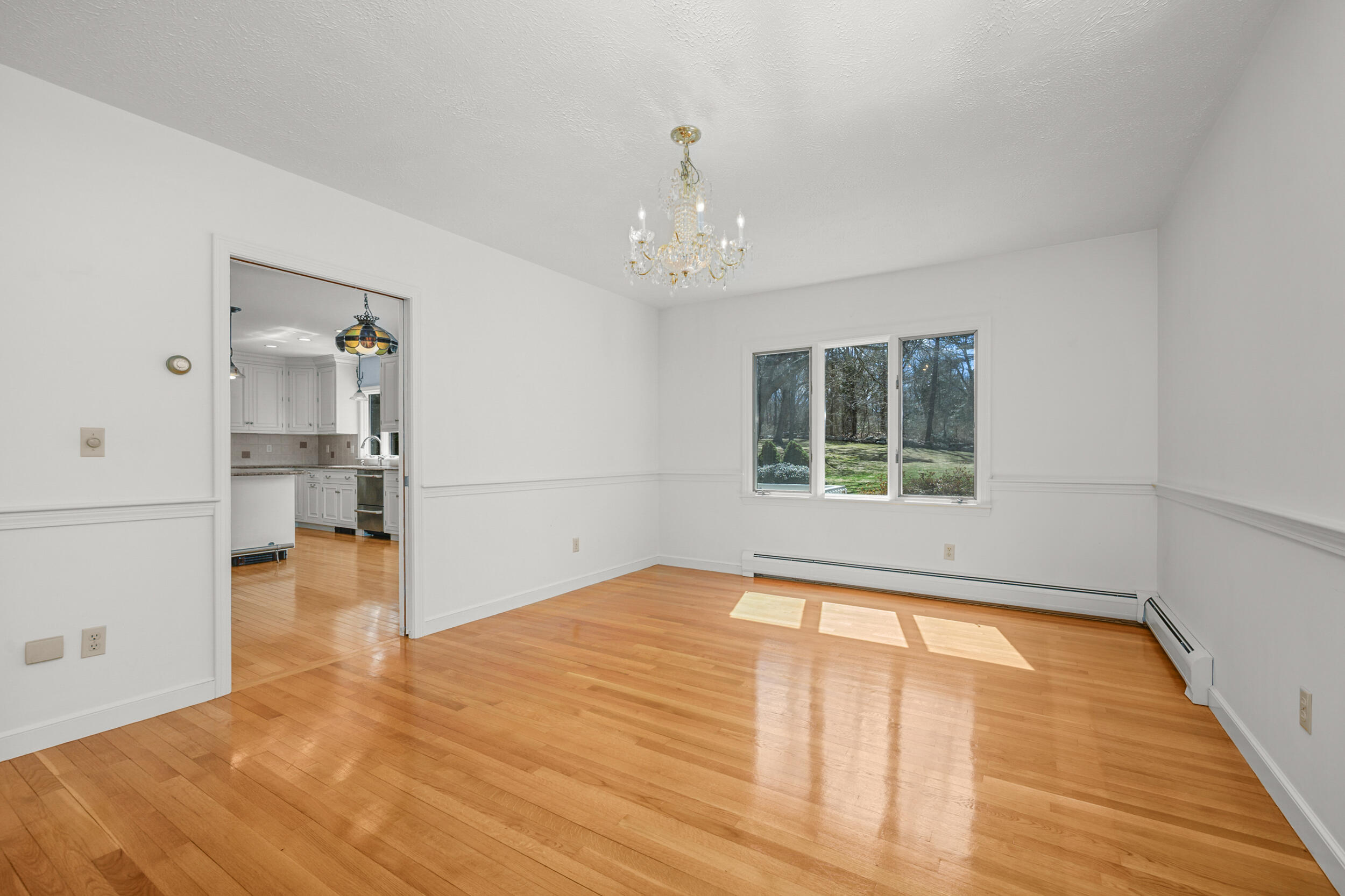 43 Sturgis Lane Barnstable, MA 02630 - Photo 20 of 70 a view of empty room with wooden floor and windows