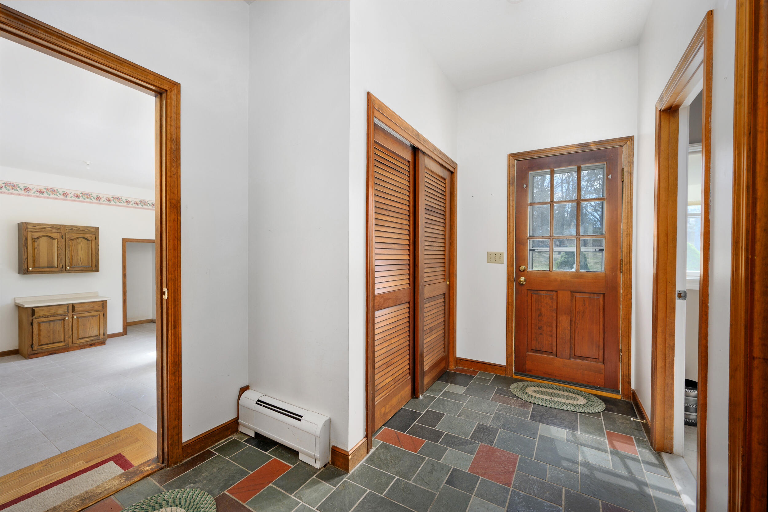 43 Sturgis Lane Barnstable, MA 02630 - Photo 28 of 70 a view of a hallway with wooden floor and windows