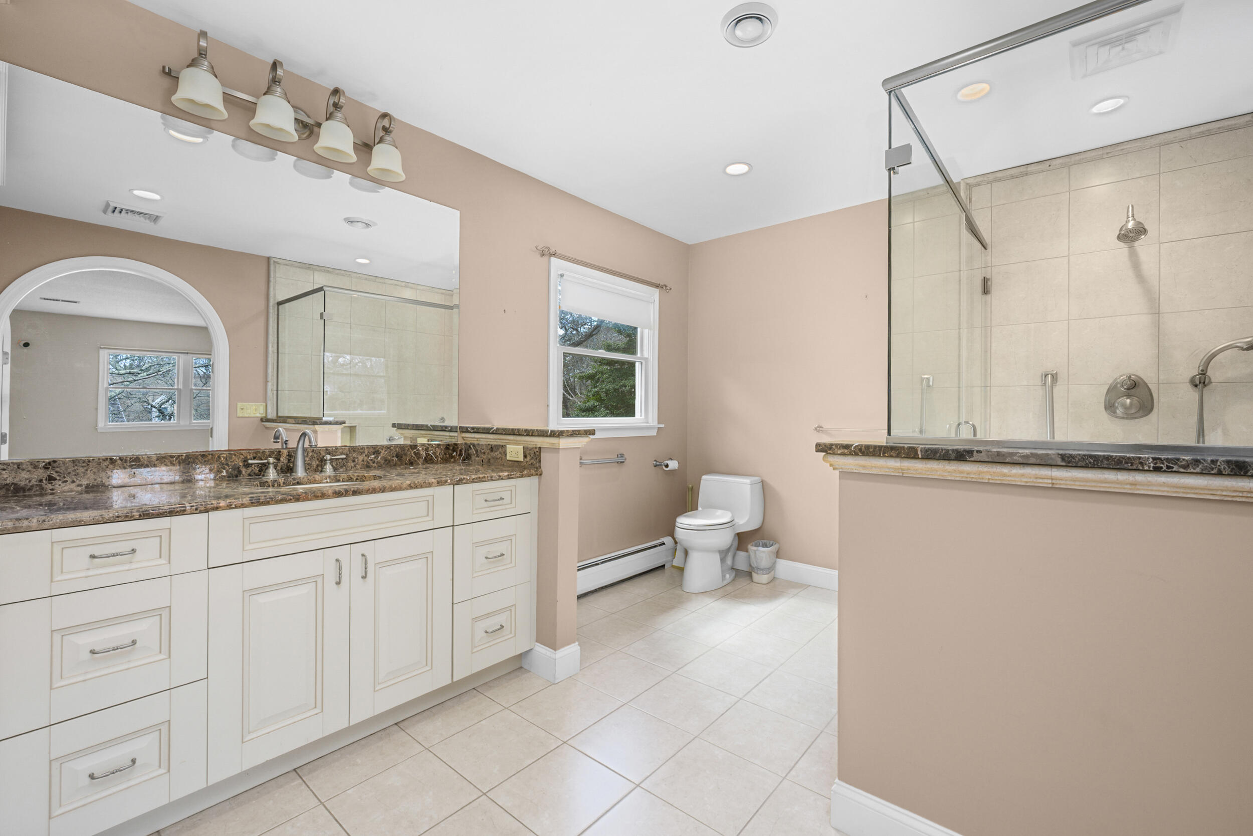 43 Sturgis Lane Barnstable, MA 02630 - Photo 33 of 70 a bathroom with a granite countertop sink mirror and toilet