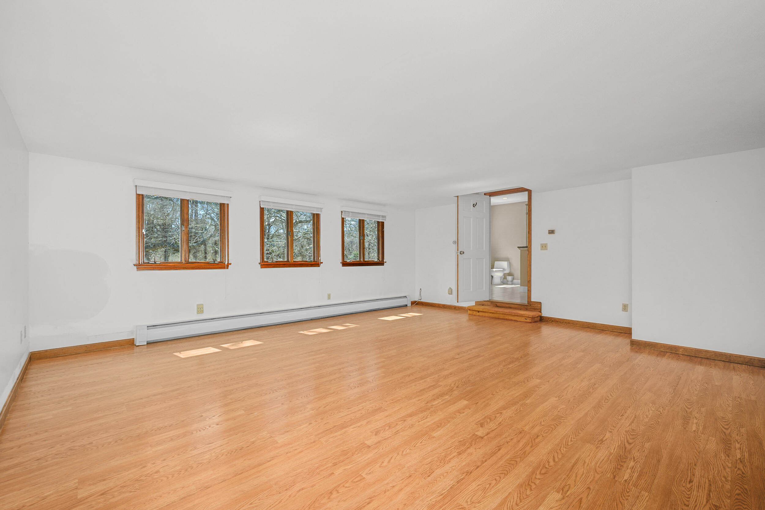 43 Sturgis Lane Barnstable, MA 02630 - Photo 36 of 70 a view of an empty room with wooden floor and a window