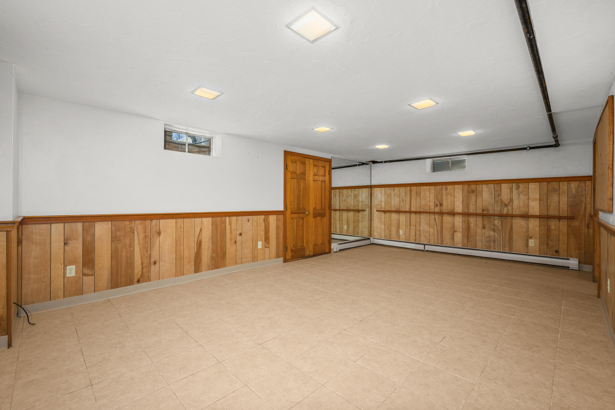 43 Sturgis Lane Barnstable, MA 02630 - Photo 49 of 70 a view of an empty room with wooden floor