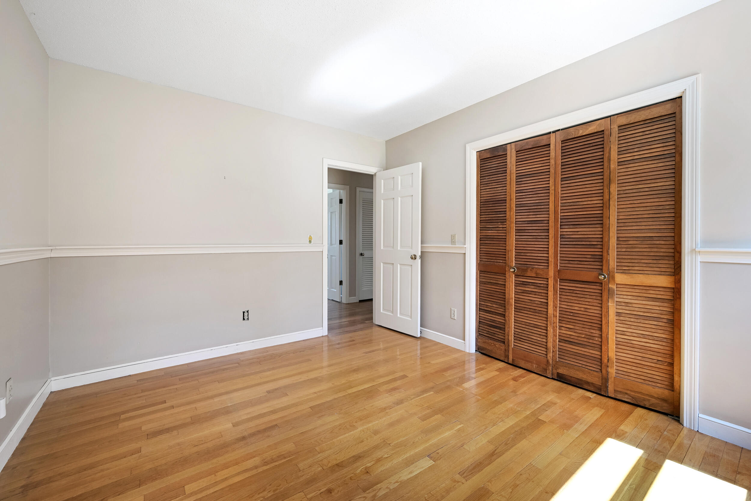 43 Sturgis Lane Barnstable, MA 02630 - Photo 63 of 70 an empty room with wooden floor and windows