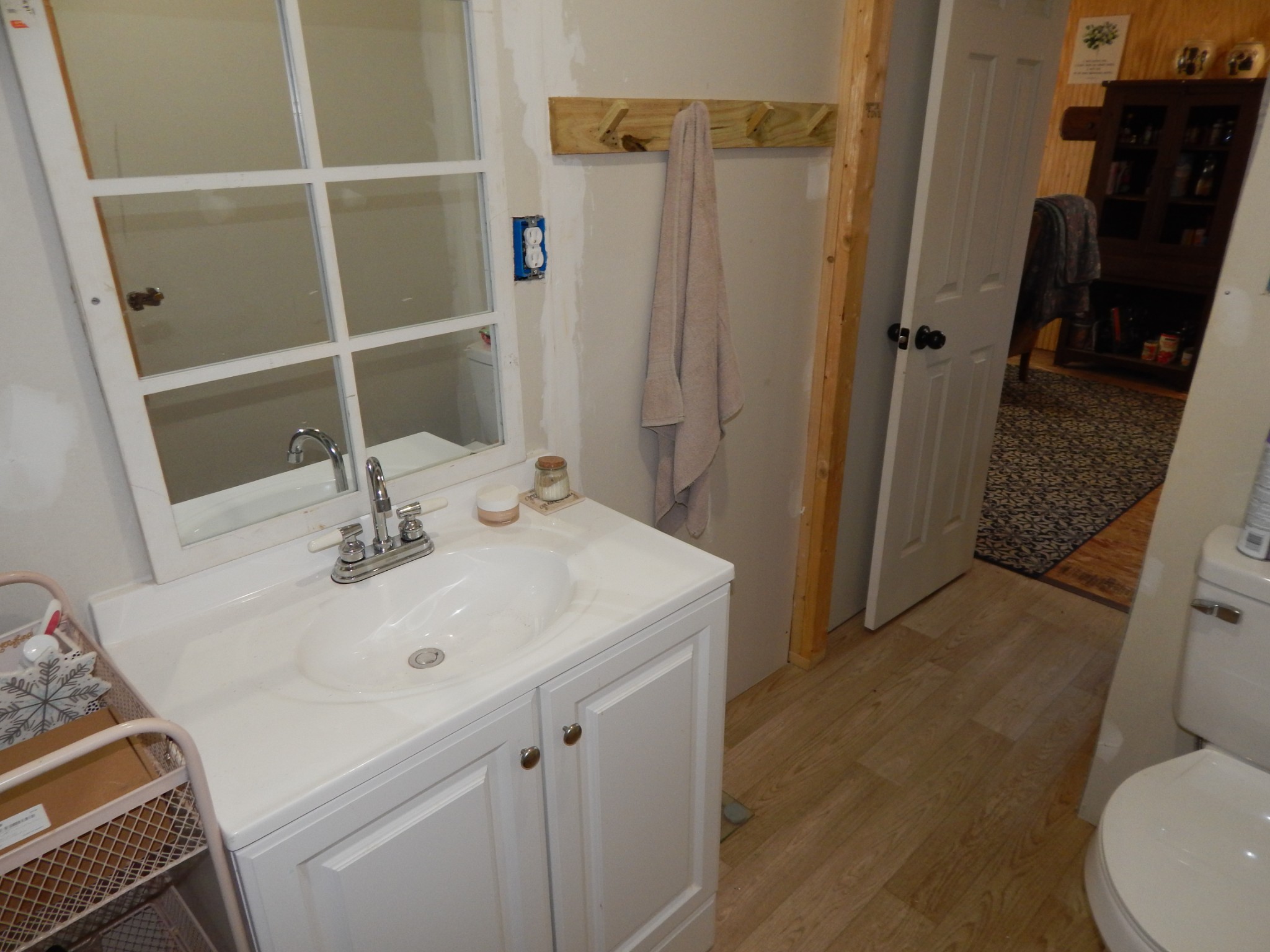 2131 Old Weatherford Creek Road Lutts, TN 38471 - Photo 19 of 64 a bathroom with a sink toilet and shower
