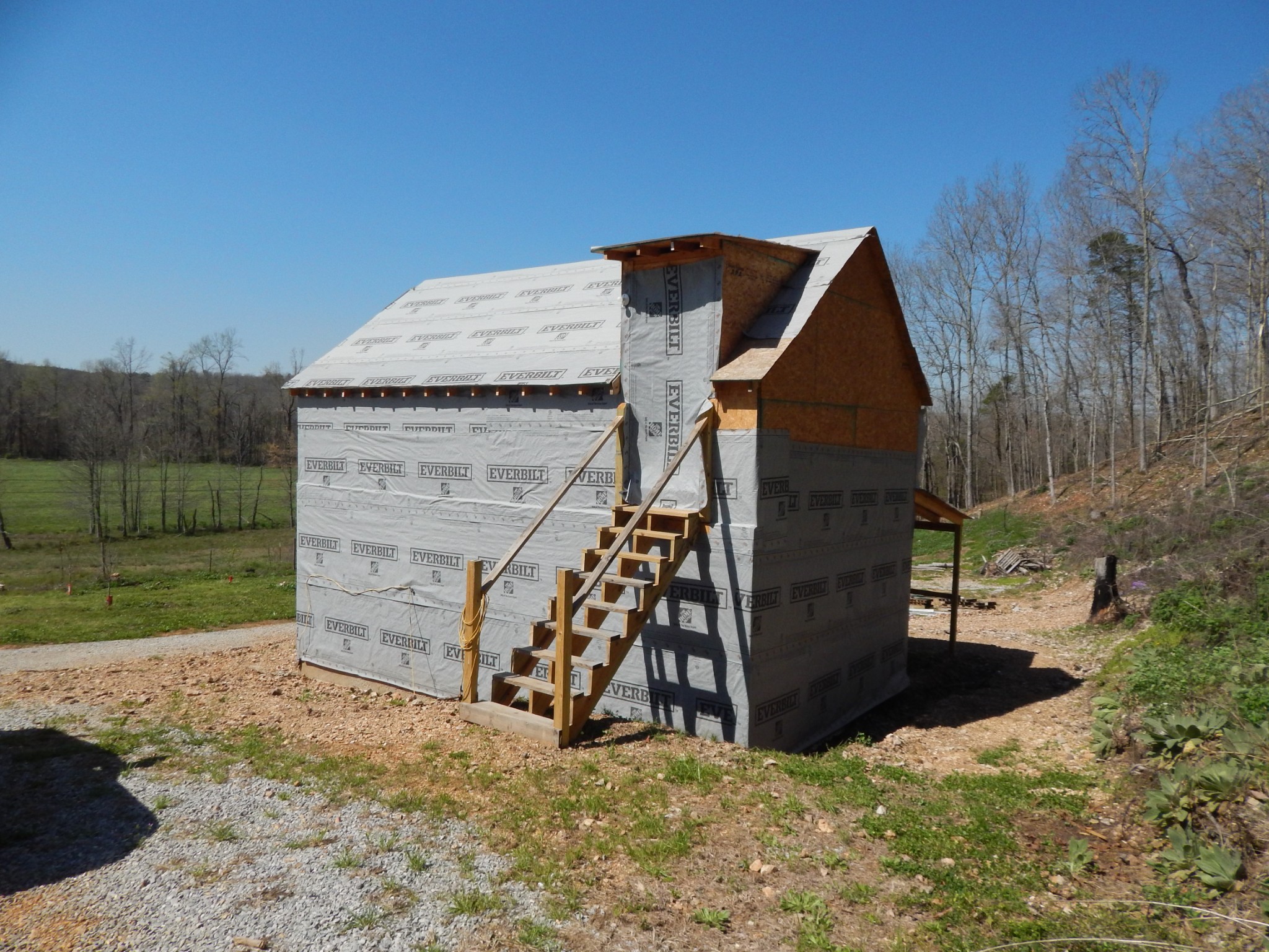 2131 Old Weatherford Creek Road Lutts, TN 38471 - Photo 32 of 64 a view of a wooden house with a yard