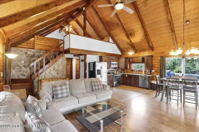 a lobby with furniture and floor to ceiling window