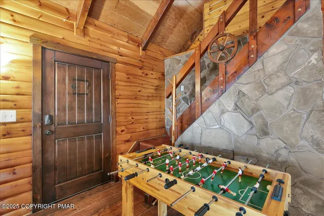 a view of entryway with a front door