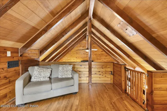 a view of a balcony with hardwood