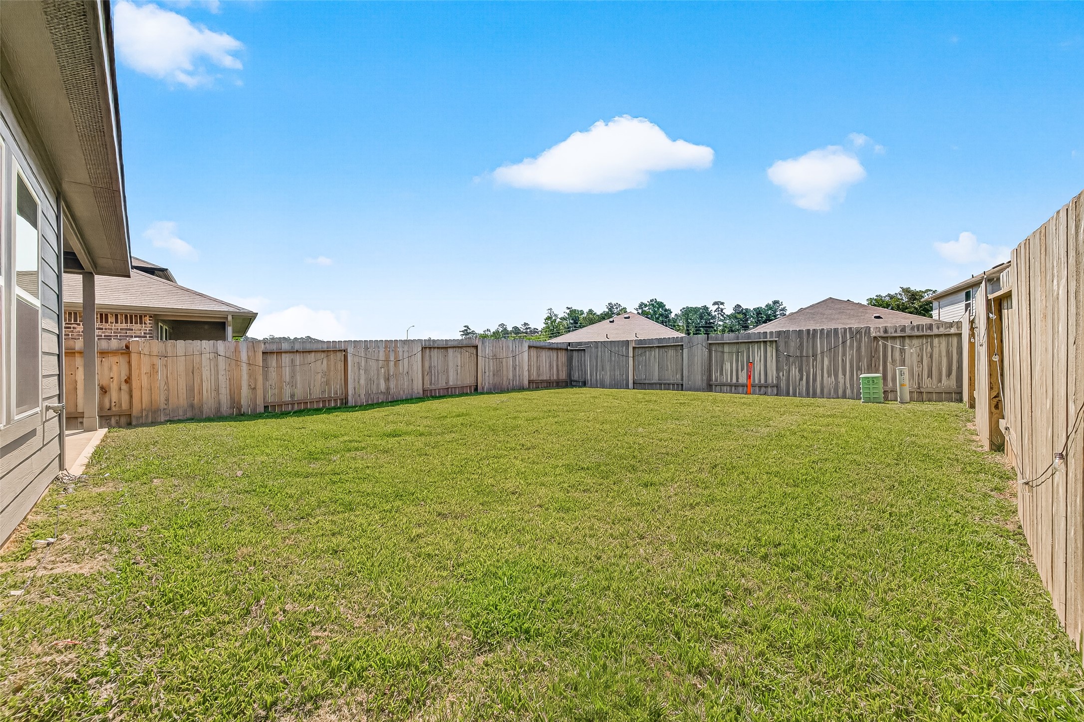 5442 Pinetree Cres Lane Spring, TX 77373 - Photo 22 of 24 Huge fully fenced backyard ideal for playtime, entertaining, and relaxing