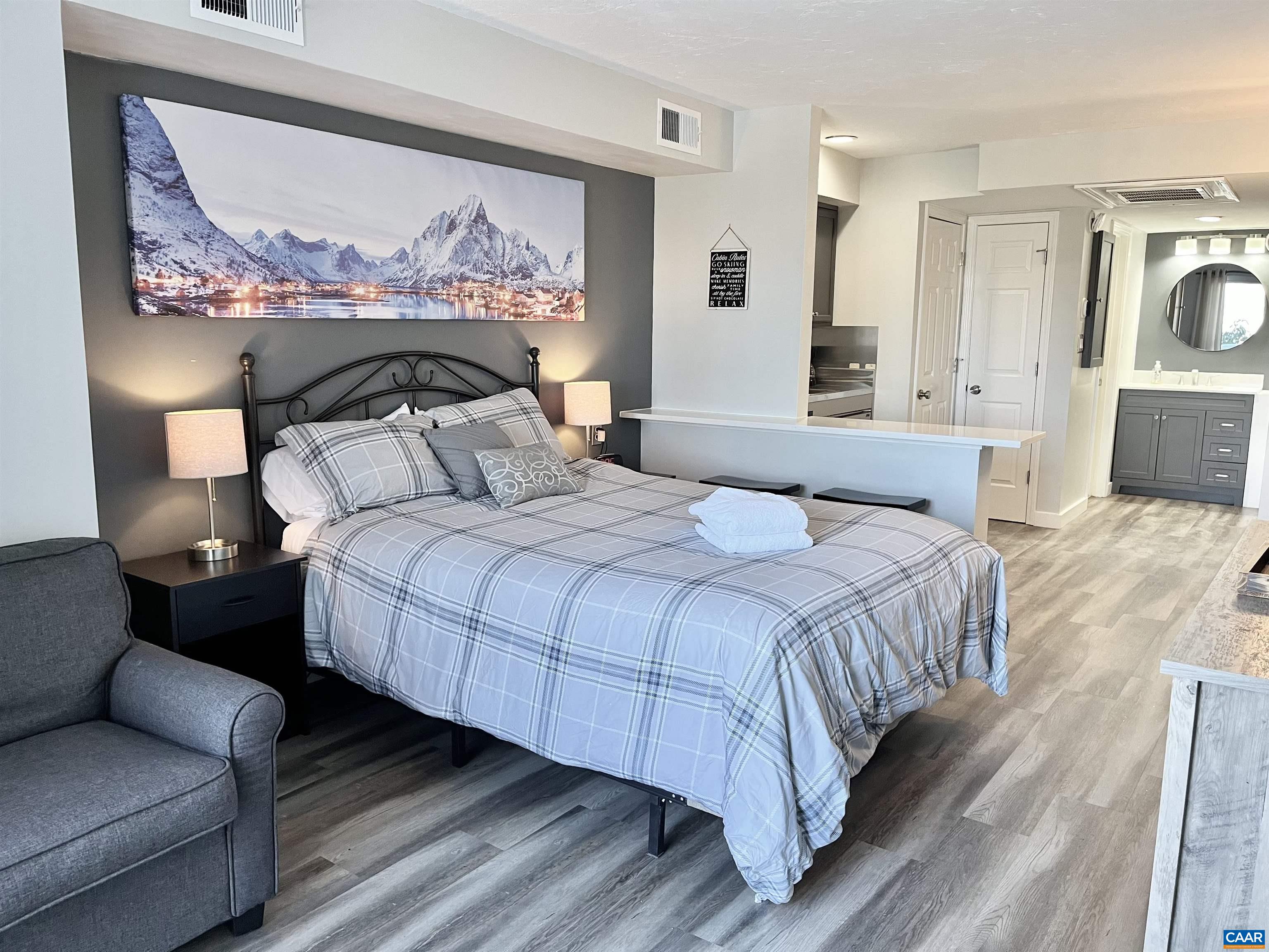 2052 Stone Ridge Wintergreen, VA 22967 - Photo 2 of 17 a bedroom with a bed and a painting on the wall